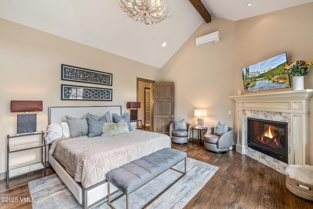 348 Red Draw, Edwards, CO 81632 - bedroom featuring beamed ceiling, a chandelier, dark wood finished floors, high vaulted ceiling, and a fireplace