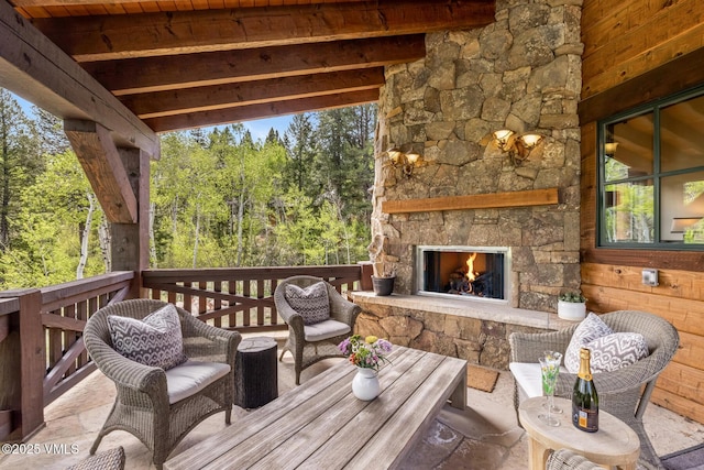 348 Red Draw, Edwards, CO 81632 - wooden deck with an outdoor stone fireplace