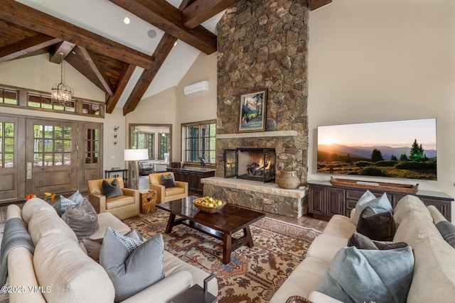 348 Red Draw, Edwards, CO 81632 - living area with wood finished floors, beam ceiling, a chandelier, high vaulted ceiling, and a fireplace
