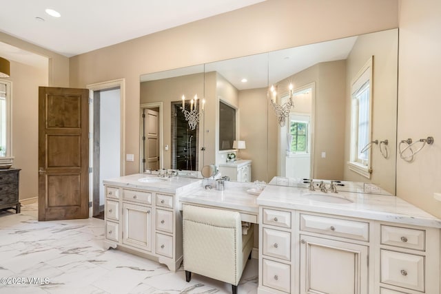348 Red Draw, Edwards, CO 81632 - full bath featuring two vanities, marble look tile flooring, and recessed lighting