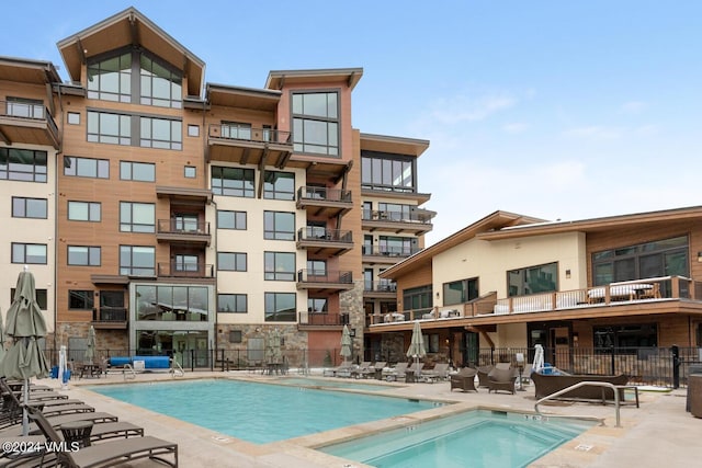 view of pool featuring a patio