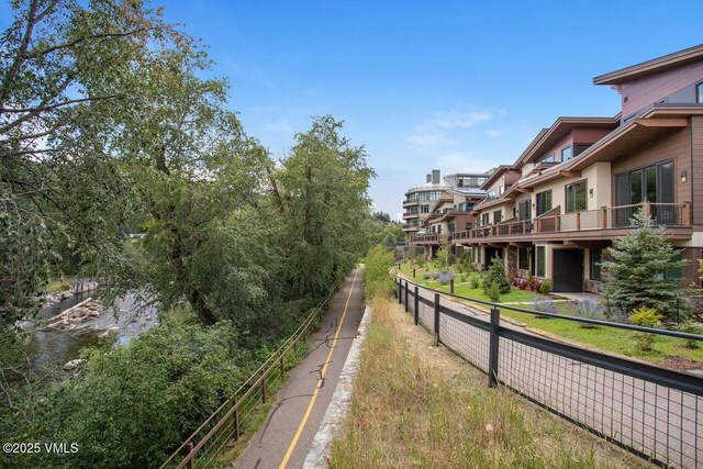 42 Riverfront Ln Unit 507, Avon, CO 81620 - rec room with recessed lighting, baseboards, pool table, an accent wall, and wood walls