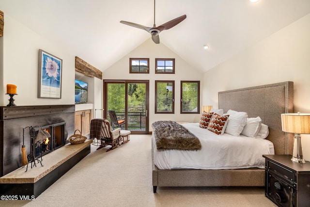 89 Trout Pond Ln, Avon, CO 81620 - bedroom with access to exterior, high vaulted ceiling, carpet floors, a warm lit fireplace, and a ceiling fan