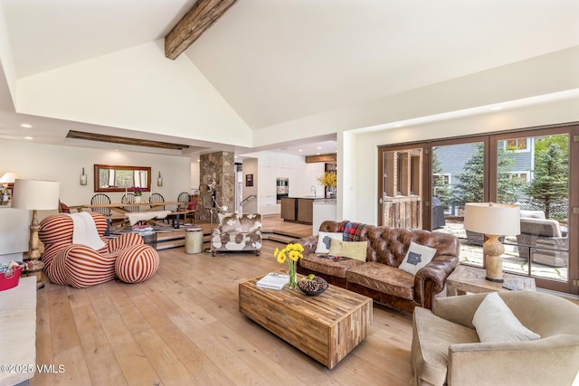 89 Trout Pond Ln, Avon, CO 81620 - living area featuring high vaulted ceiling, beamed ceiling, light wood-type flooring, and recessed lighting