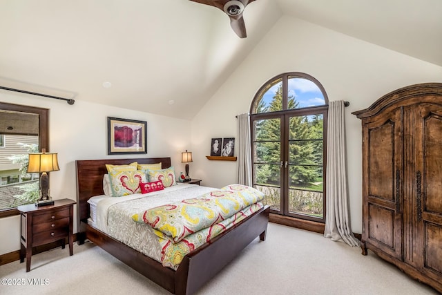 89 Trout Pond Ln, Avon, CO 81620 - bedroom featuring light colored carpet, multiple windows, high vaulted ceiling, and ceiling fan