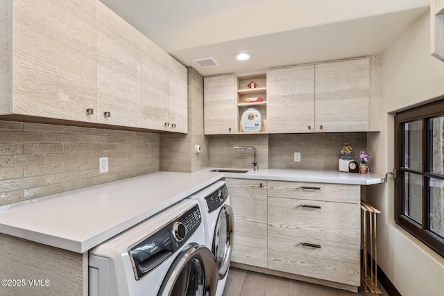 89 Trout Pond Ln, Avon, CO 81620 - laundry area with washer and clothes dryer, cabinet space, light wood-style floors, and recessed lighting