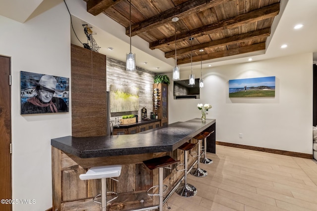 89 Trout Pond Ln, Avon, CO 81620 - indoor wet bar featuring a wooden ceiling with exposed beams, decorative light fixtures, light wood finished floors, and recessed lighting