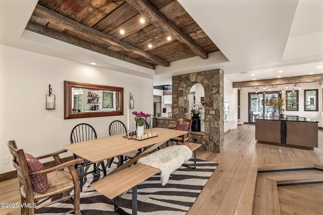 89 Trout Pond Ln, Avon, CO 81620 - dining room with a wood ceiling with exposed beams, light wood-style flooring, and arched walkways