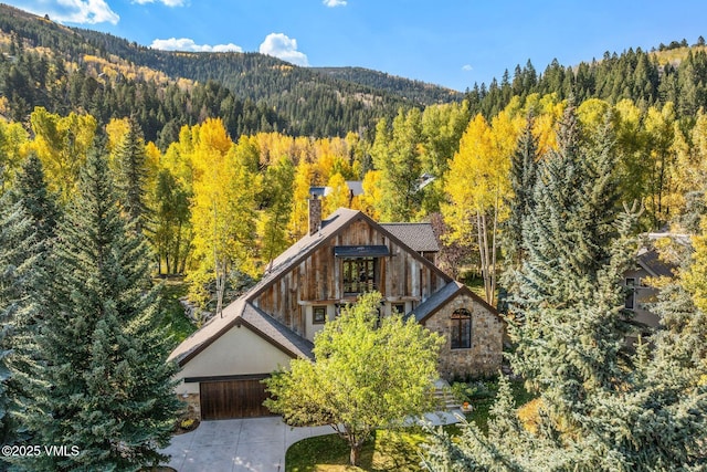 89 Trout Pond Ln, Avon, CO 81620 - view of mountain backdrop with a heavily wooded area