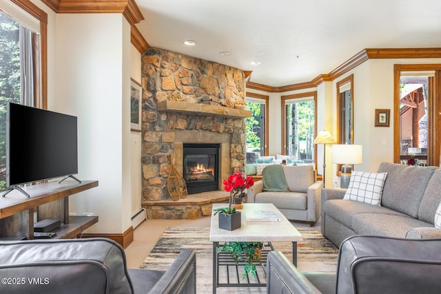 62 Highlands Ln Unit R103, R102, Beaver Creek, CO 81620 - living room with crown molding, a stone fireplace, baseboard heating, and recessed lighting