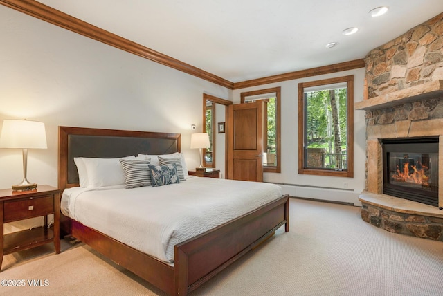 62 Highlands Ln Unit R103, R102, Beaver Creek, CO 81620 - bedroom with ornamental molding, baseboard heating, a fireplace, and carpet