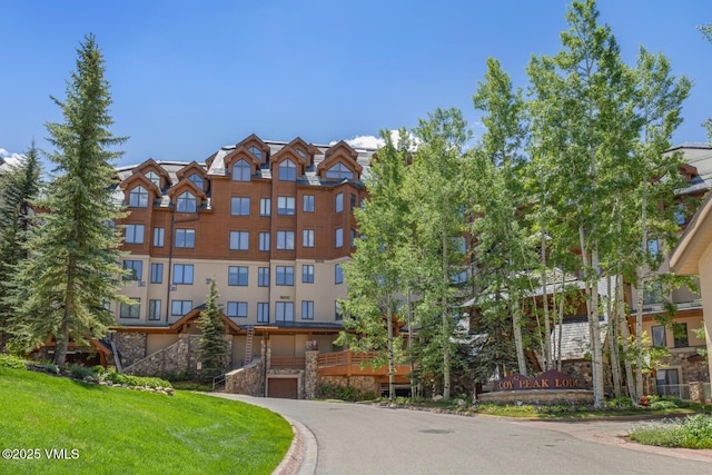 62 Highlands Ln Unit R103, R102, Beaver Creek, CO 81620 - view of property with a garage