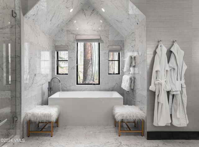 47 Woodviolet Rd, Avon, CO 81620 - full bath with a freestanding bath, tile walls, a shower stall, and lofted ceiling