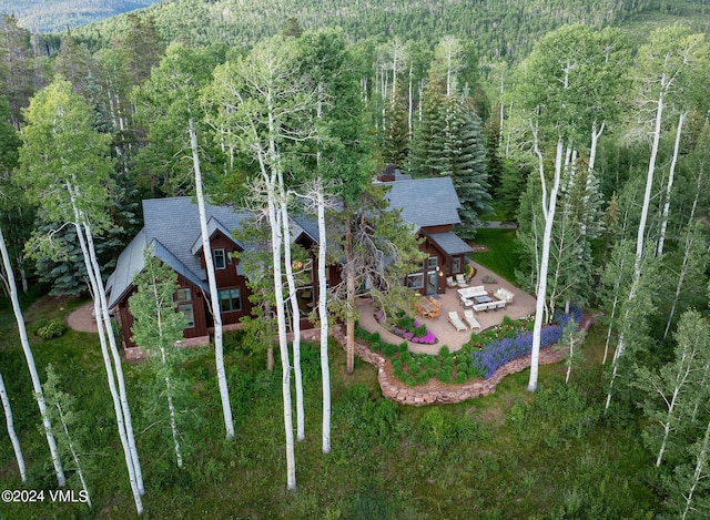 47 Woodviolet Rd, Avon, CO 81620 - aerial view featuring a wooded view