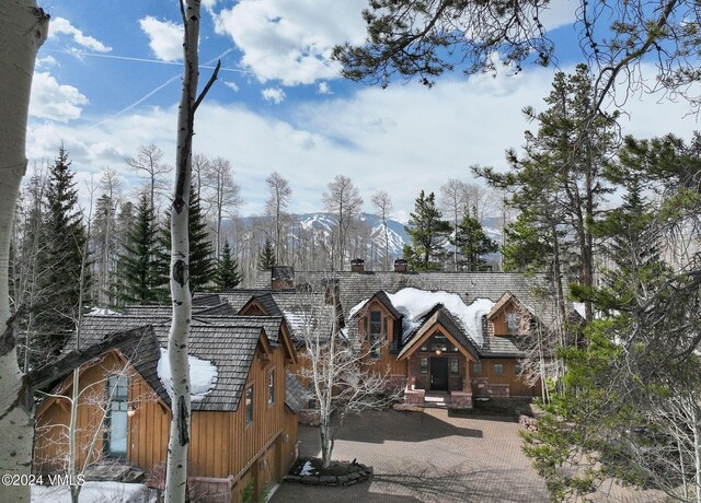 log cabin with a mountain view