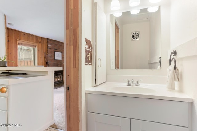 4255 Columbine Way Unit 16, Vail, CO 81657 - bathroom with vanity and wood walls