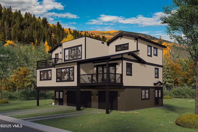 19 Belden Way, Minturn, CO 81645 - rear view of house with a balcony, a lawn, a garage, and a mountain view