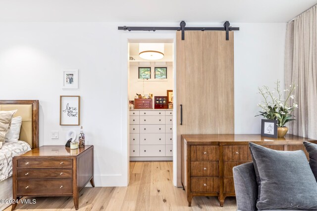 bedroom with light hardwood / wood-style floors