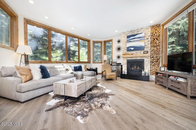 775 Potato Patch Dr Unit E, Vail, CO 81657 - living area featuring wood finished floors, a fireplace, and recessed lighting