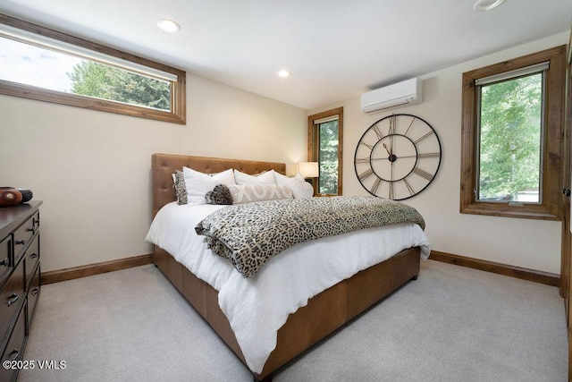 775 Potato Patch Dr Unit E, Vail, CO 81657 - bedroom featuring a wall unit AC, light colored carpet, multiple windows, and recessed lighting