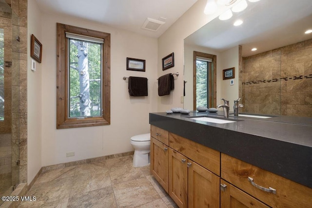 775 Potato Patch Dr Unit E, Vail, CO 81657 - full bath with vanity, tiled shower, and stone finish floors