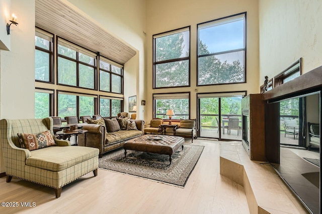 225 Daisy Ln Unit A, Eagle-Vail, CO 81620 - living area with a towering ceiling, plenty of natural light, and wood finished floors