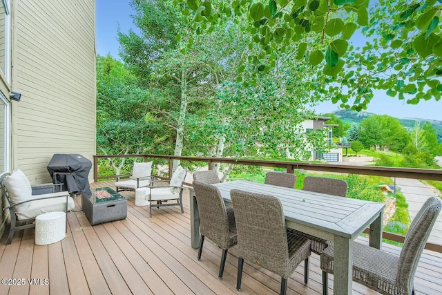 225 Daisy Ln Unit A, Eagle-Vail, CO 81620 - wooden terrace featuring outdoor dining area and an outdoor living space