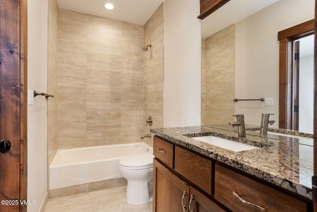 bathroom with toilet, shower / bath combination, tile patterned flooring, and vanity