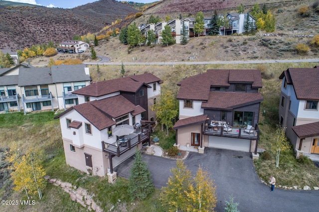 bird's eye view featuring a residential view and a mountain view