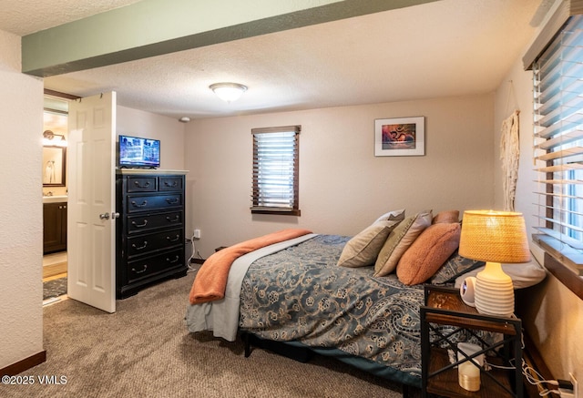 636 Valley Rd, Gypsum, CO 81637 - carpeted bedroom featuring a textured ceiling
