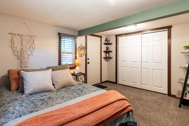 636 Valley Rd, Gypsum, CO 81637 - carpeted bedroom with baseboards and two closets