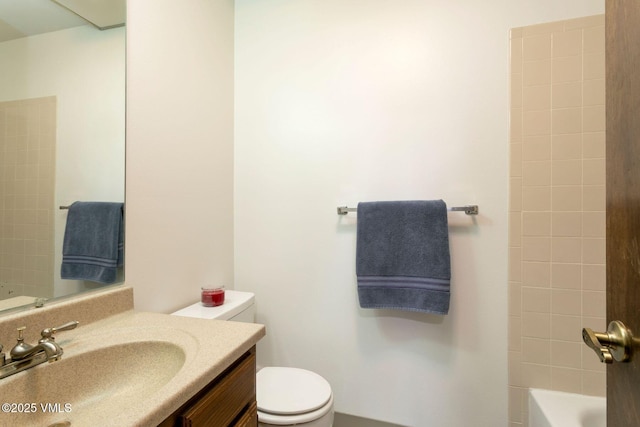 full bathroom with vanity and toilet