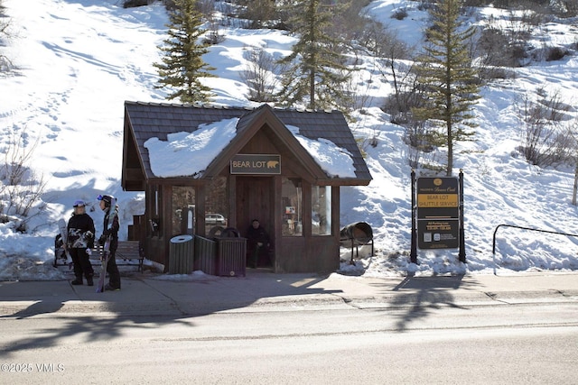 view of snow covered property