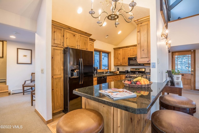 kitchen featuring sink, a breakfast bar, high vaulted ceiling, black appliances, and dark stone counters