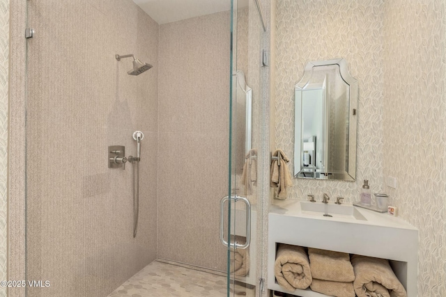 1531 Lake Creek Rd, Edwards, CO 81632 - full bath with a shower stall, vanity, and wallpapered walls