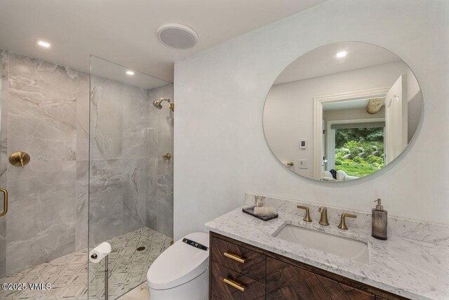1531 Lake Creek Rd, Edwards, CO 81632 - bathroom featuring a marble finish shower, vanity, and recessed lighting