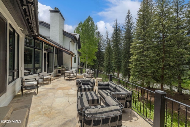 1531 Lake Creek Rd, Edwards, CO 81632 - view of patio / terrace with an outdoor living space