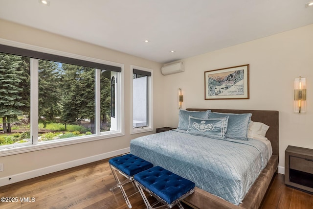 1531 Lake Creek Rd, Edwards, CO 81632 - bedroom featuring multiple windows, baseboards, wood finished floors, and recessed lighting