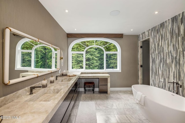 1531 Lake Creek Rd, Edwards, CO 81632 - full bath with a soaking tub, plenty of natural light, double vanity, baseboards, and recessed lighting