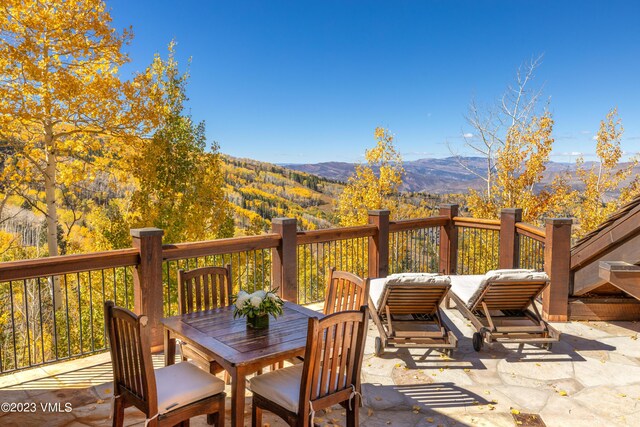 wooden deck featuring a mountain view