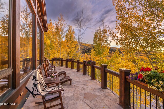 view of patio terrace at dusk