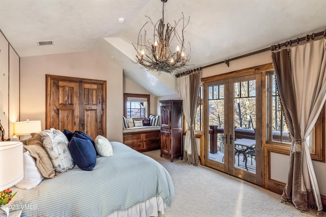 bedroom with vaulted ceiling, a notable chandelier, access to outside, light colored carpet, and french doors