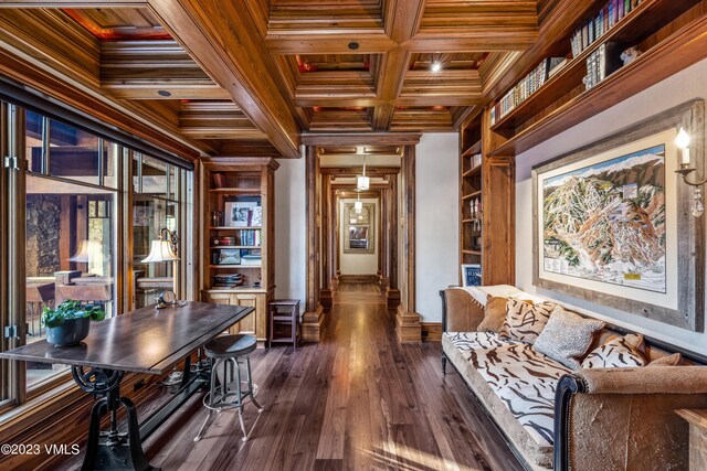 office with coffered ceiling, wood ceiling, crown molding, dark hardwood / wood-style flooring, and beam ceiling