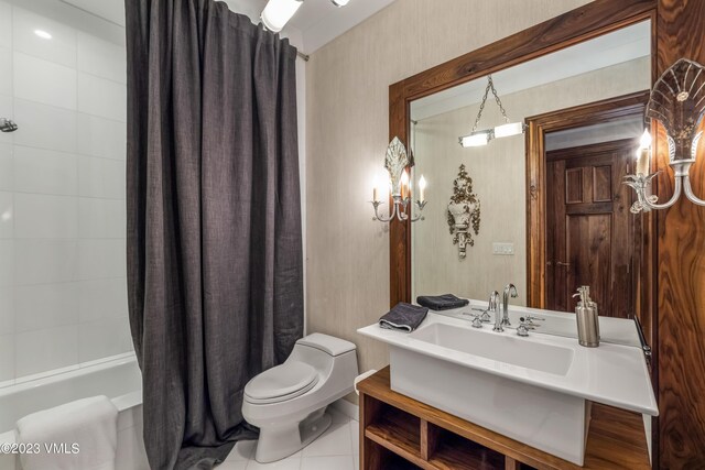 full bathroom with vanity, tile patterned floors, shower / bath combination with curtain, and toilet