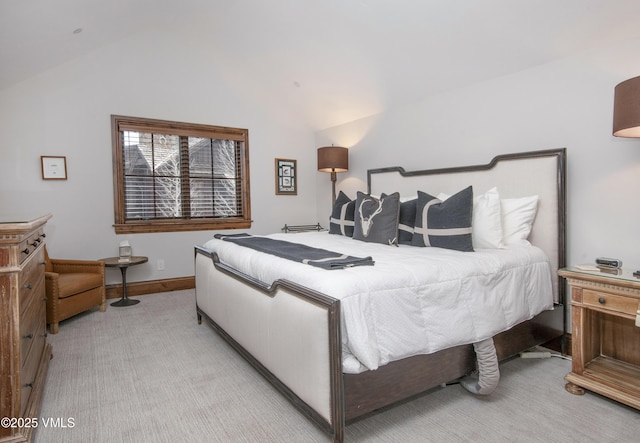 233 Wildflower Ln, Wolcott, CO 81655 - bedroom with lofted ceiling, light colored carpet, and baseboards