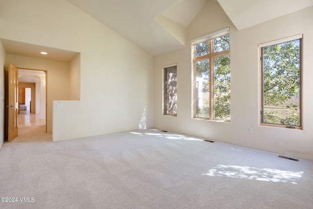 4765 Wildridge Rd, Avon, CO 81620 - empty room with visible vents, carpet flooring, and high vaulted ceiling