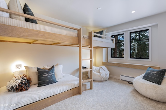 carpeted bedroom featuring a baseboard radiator and recessed lighting