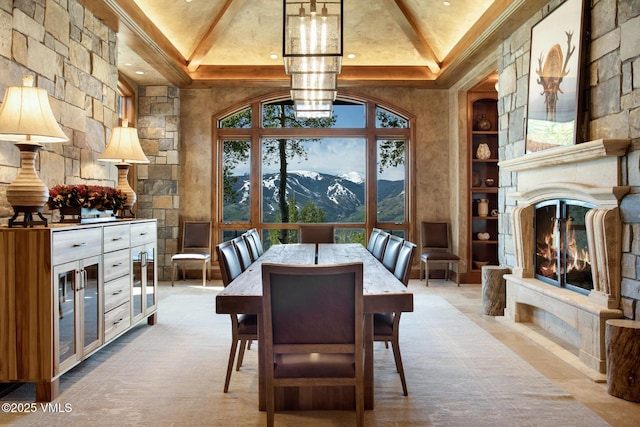 46 Jasmine, Avon, CO 81620 - dining room with beam ceiling, a mountain view, a chandelier, a glass covered fireplace, and recessed lighting
