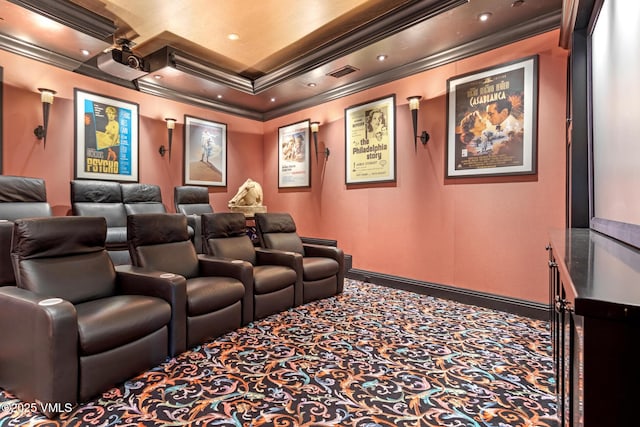 carpeted home theater featuring ornamental molding