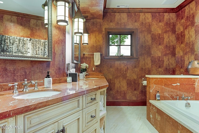 46 Jasmine, Avon, CO 81620 - bathroom with double vanity, a garden tub, and crown molding